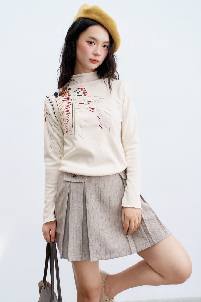 Áo len trắng leo thêu vai