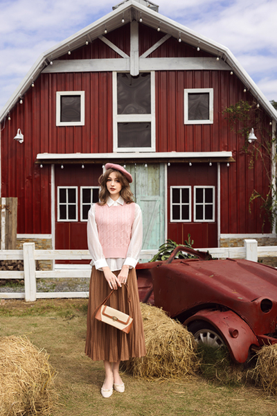 Áo gile len vặn thừng hồng kem