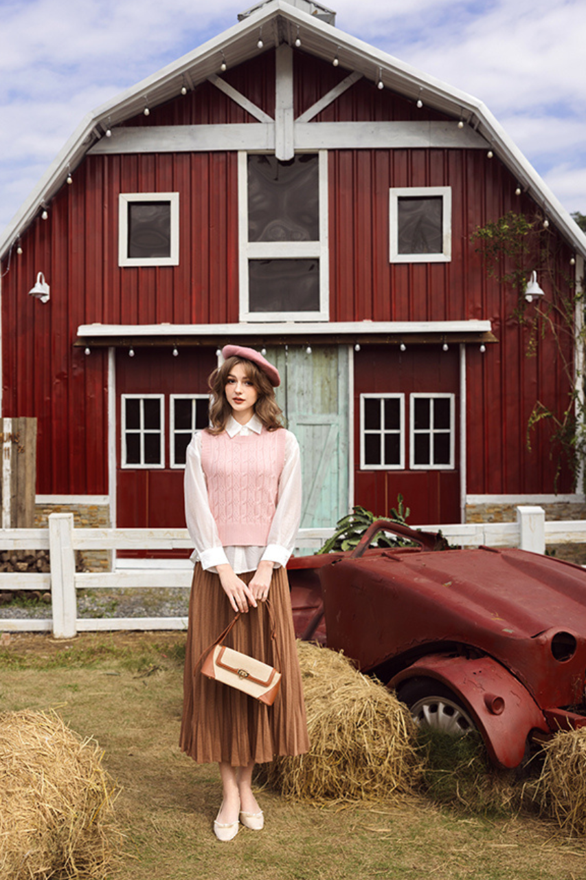 Áo gile len vặn thừng hồng kem