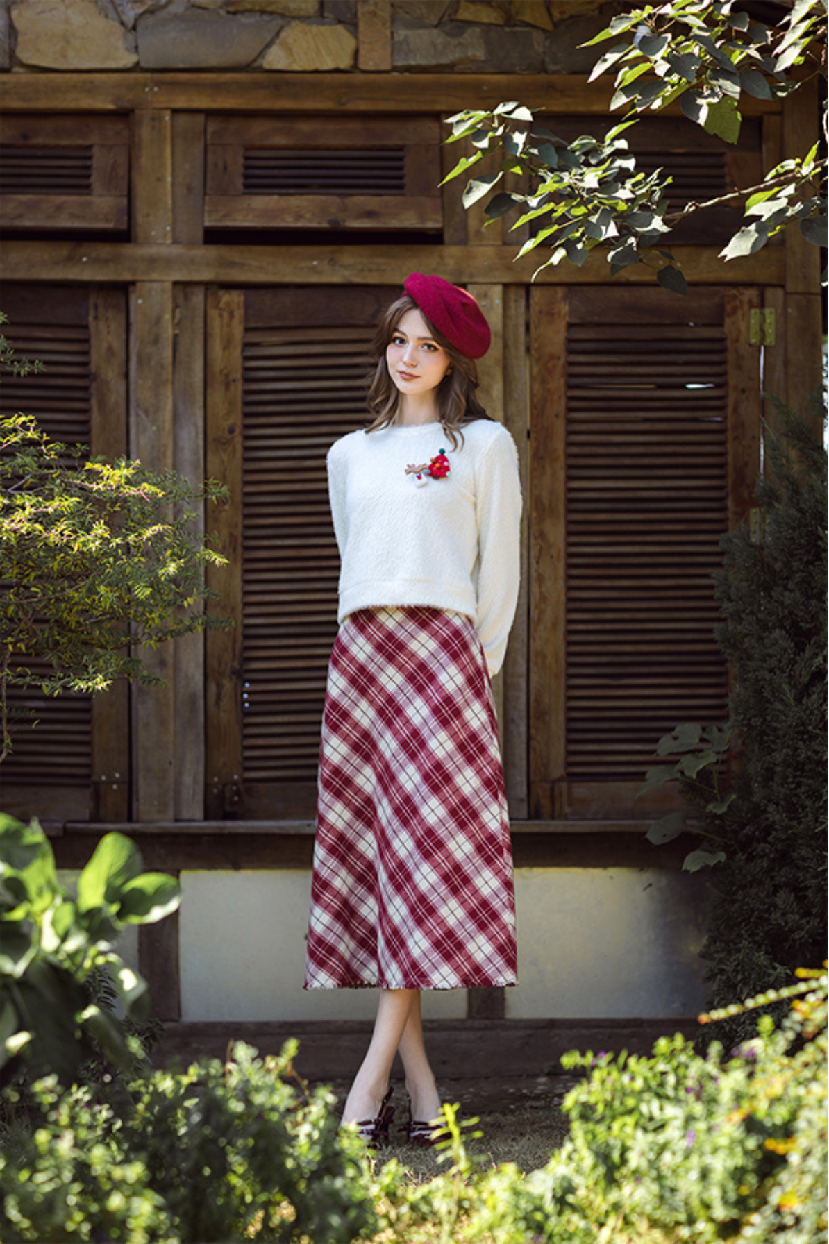 Chân váy midi karo đỏ rua gấu