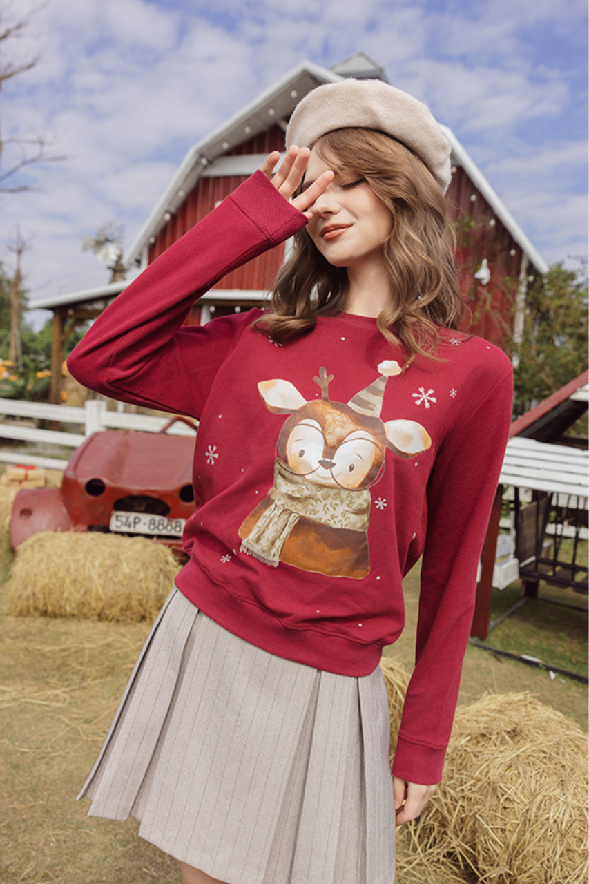 Áo nỉ đỏ đô in tuần lộc