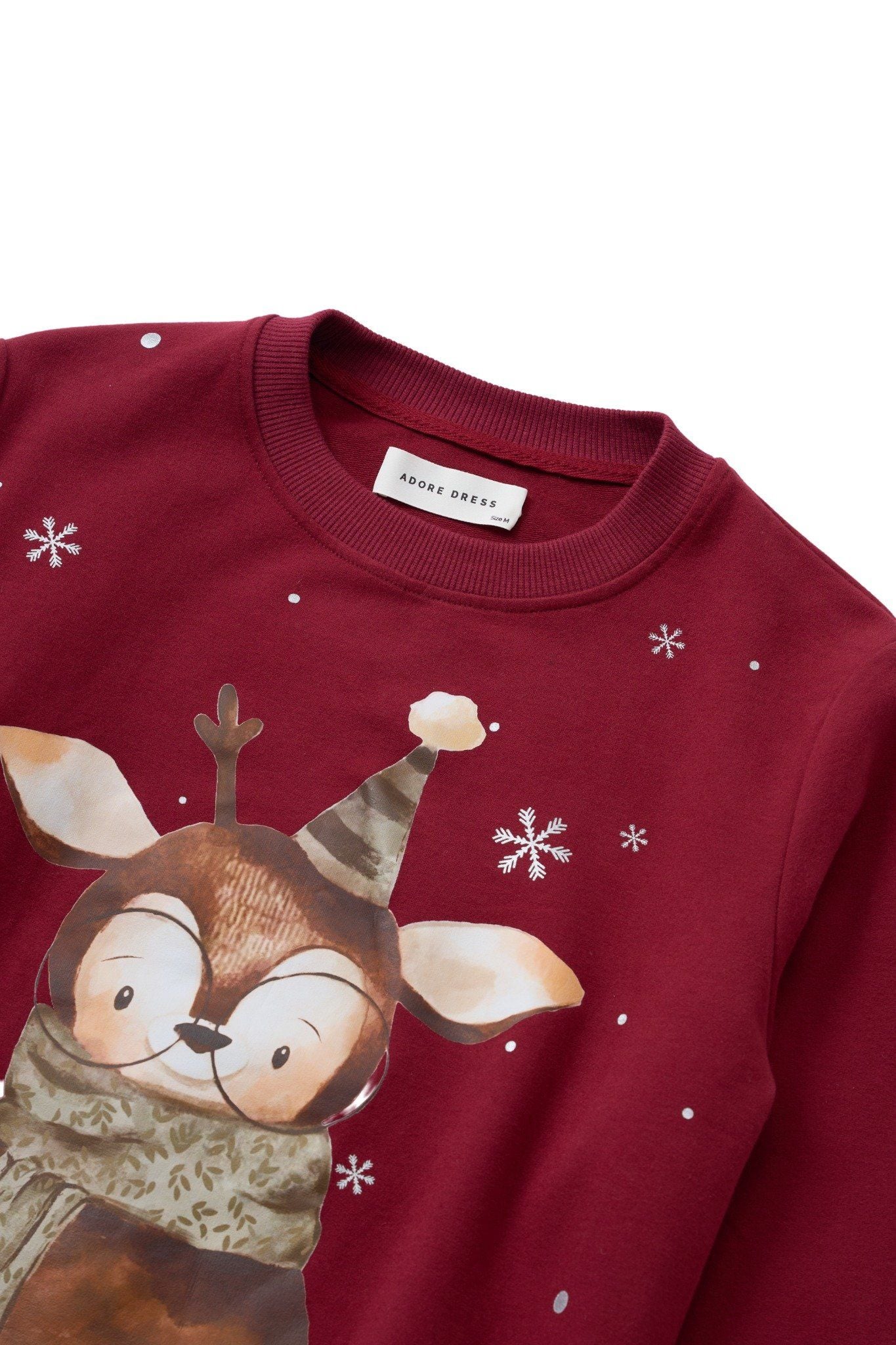 Áo nỉ đỏ đô in tuần lộc