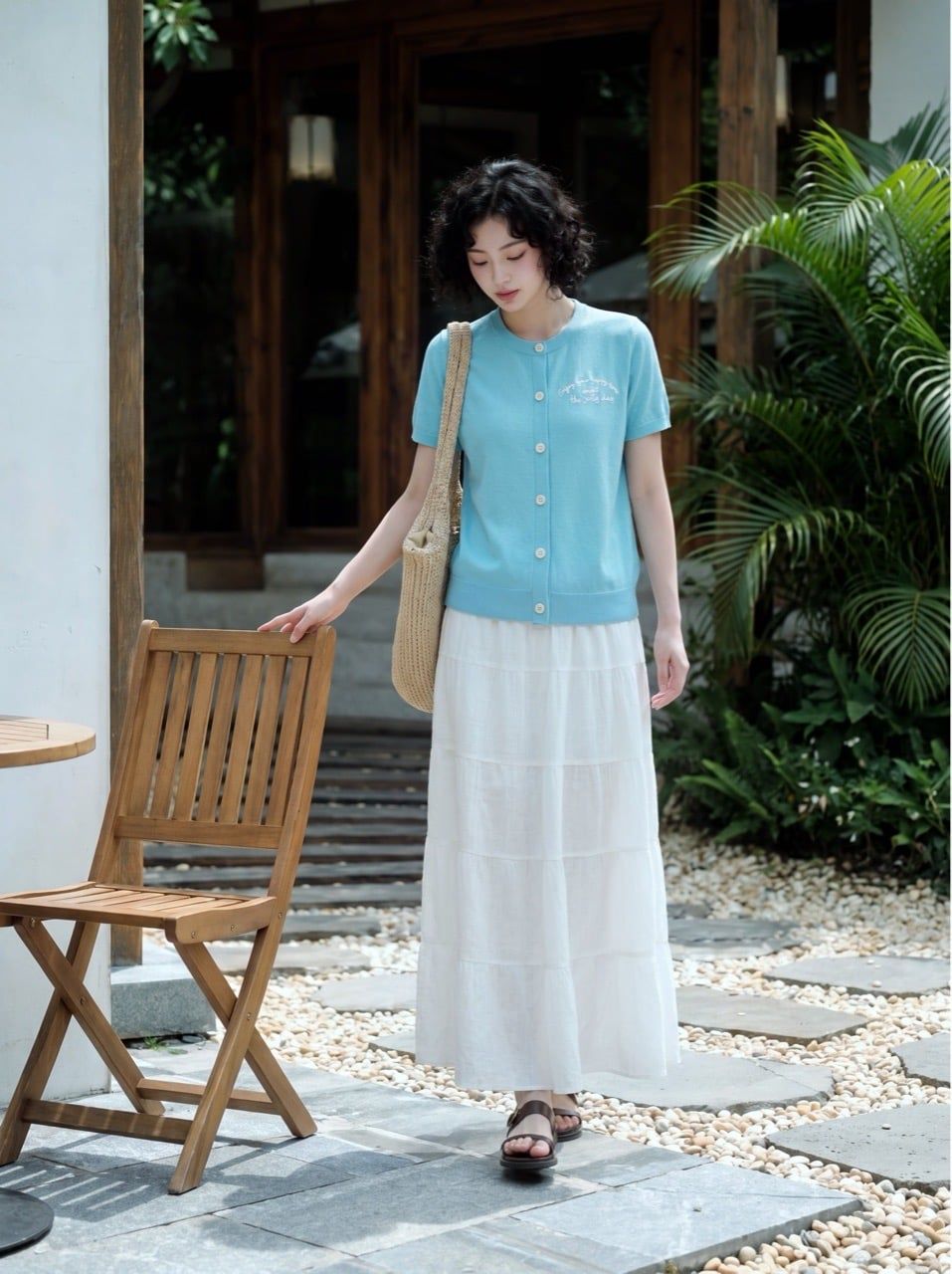  Áo thun dệt xanh ngọc lam thêu ngực 