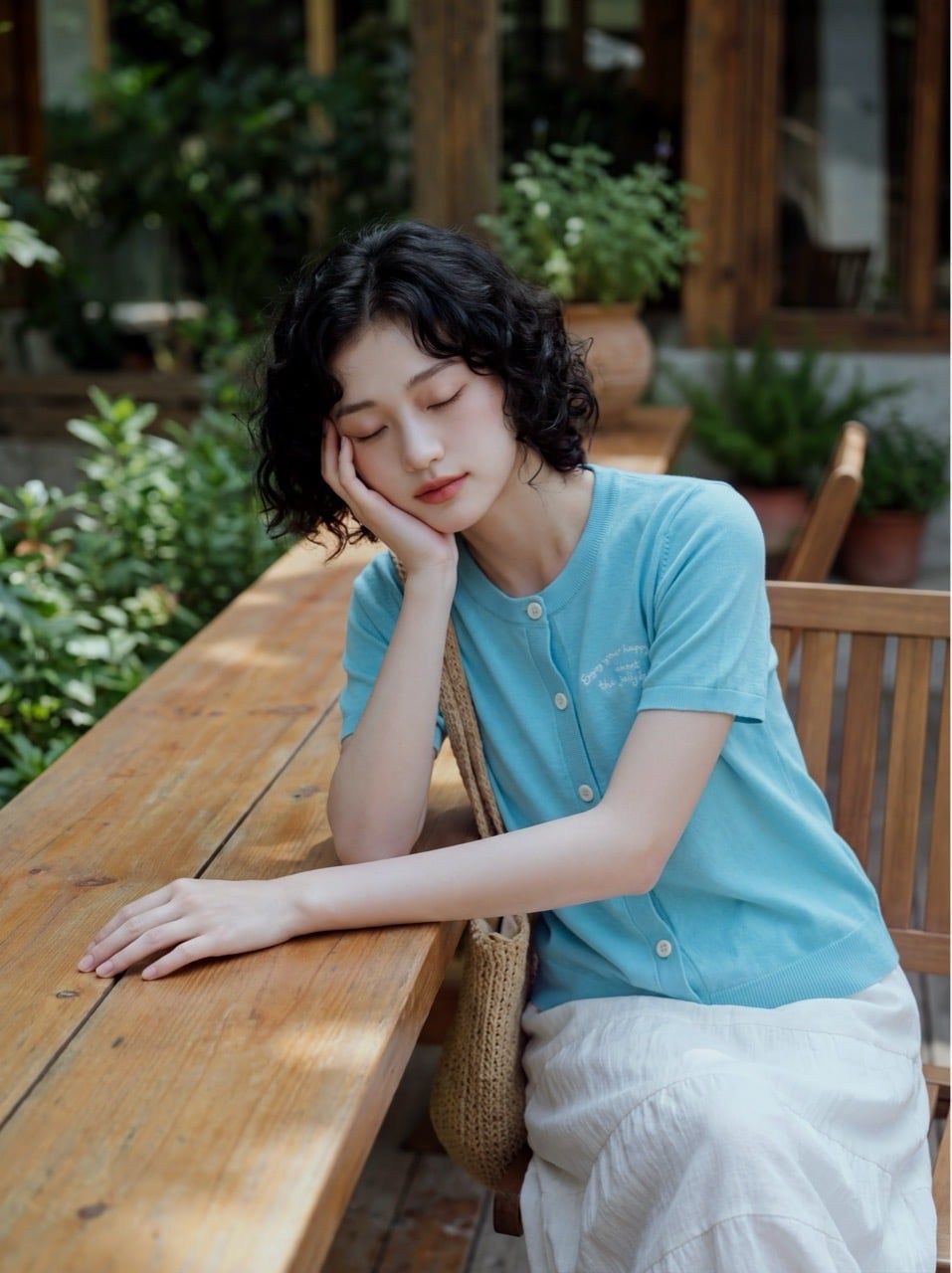  Áo thun dệt xanh ngọc lam thêu ngực 