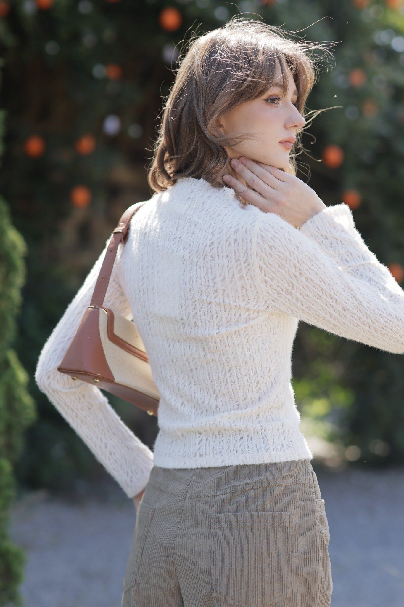 Top dài tay thun lưới kem cổ leo