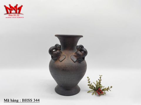  Bình gốm hình đầu 4 con voi . 