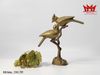 Tượng đồng hình chim và chim non trên cành cao