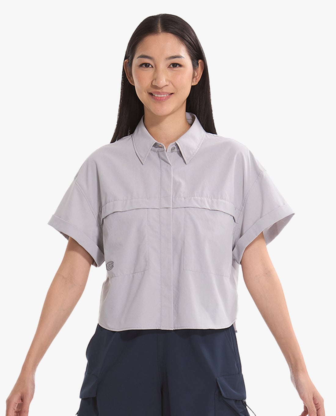 SKECHERS - Áo sơ mi nữ cổ bẻ tay ngắn phom croptop