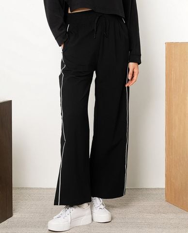  SKECHERS - Quần dài nữ ống rộng lưng thun năng động 