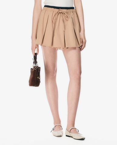  GIGI - Chân váy xếp li mini phối dây rút 