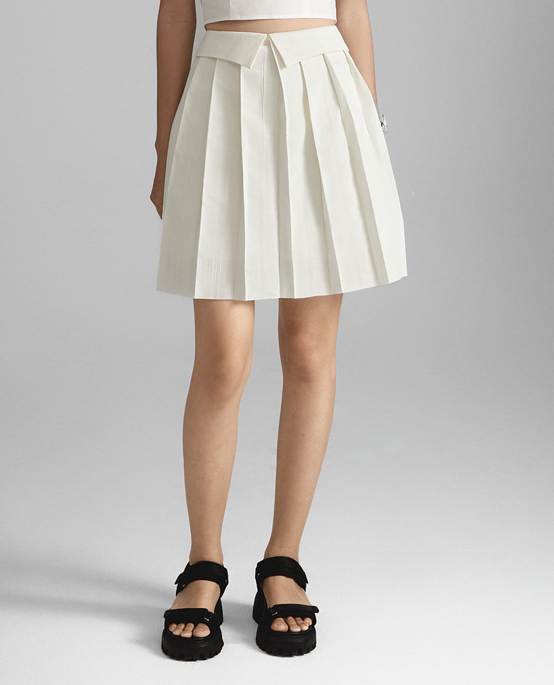 THOME - Chân váy xếp li mini Mây