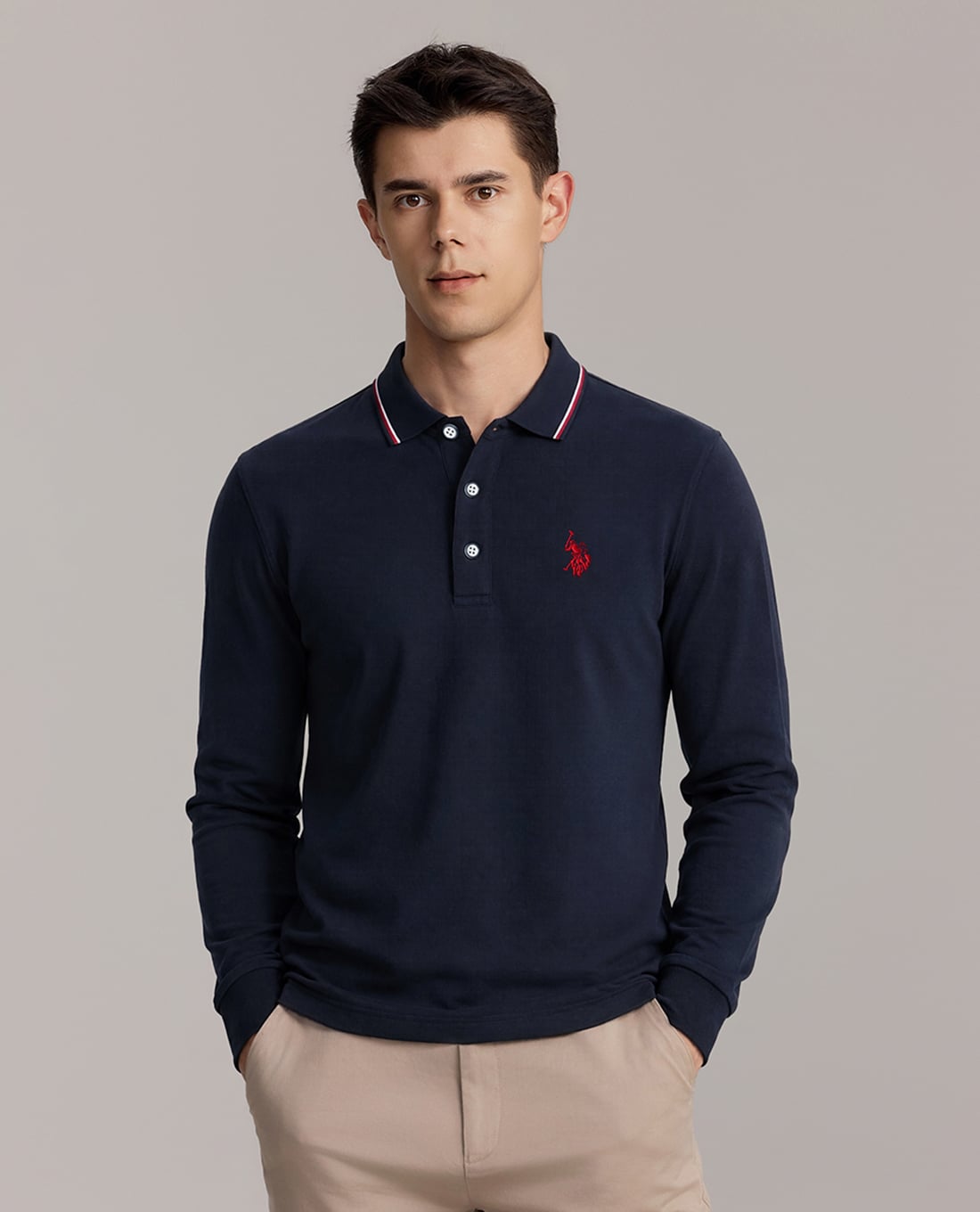 USPA - Áo polo nam tay dài phối viền thêu logo