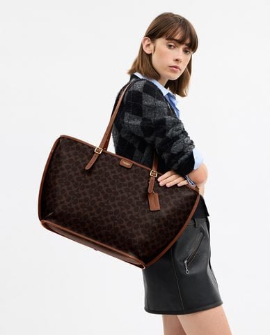  COACH - Túi tote nữ hình thang Taxi In Signature Canvas 