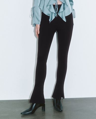  URBAN REVIVO - Quần nữ ống loe phom ôm xẻ tà 