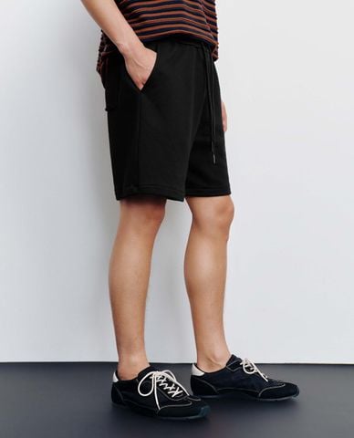  URBAN REVIVO - Quần short nam ống rộng lưng thun dây rút 