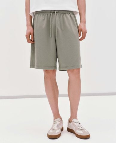 URBAN REVIVO - Quần short nam ống rộng lưng thun dây rút 