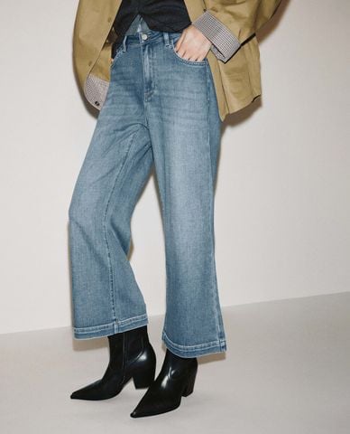  URBAN REVIVO - Quần jeans nữ ống loe wash bạc 