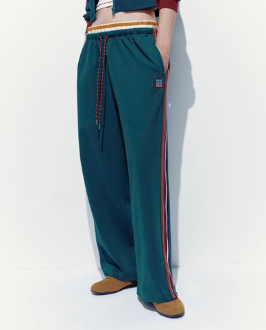  URBAN REVIVO - Quần dài nữ ống rộng lưng thun phối viền 