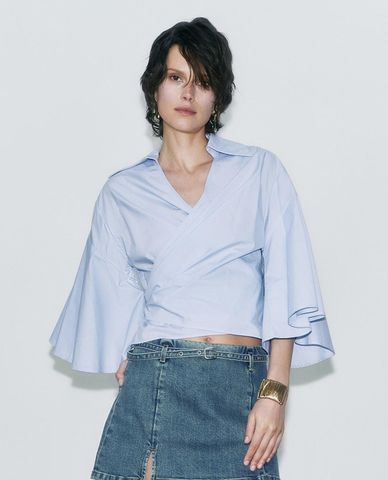  URBAN REVIVO - Áo kiểu nữ cổ V tay ống loe vạt chéo 