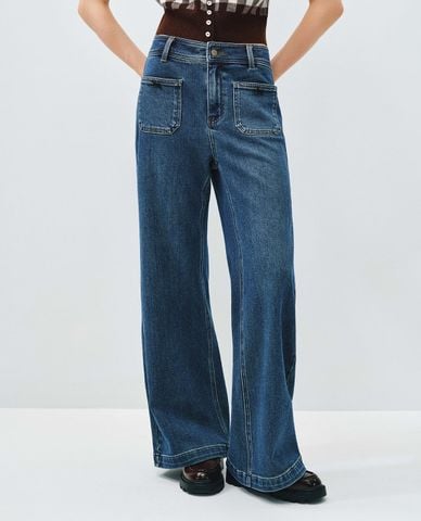  URBAN REVIVO - Quần jeans nữ ống loe wash bạc đính nơ 