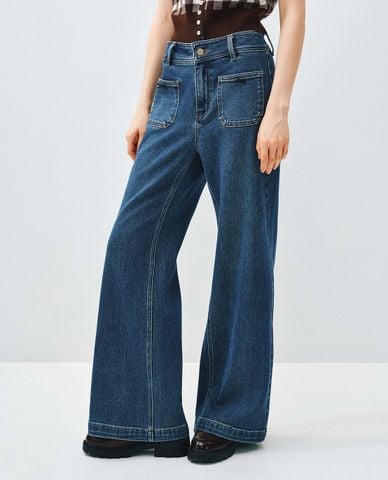  URBAN REVIVO - Quần jeans nữ ống loe wash bạc đính nơ 