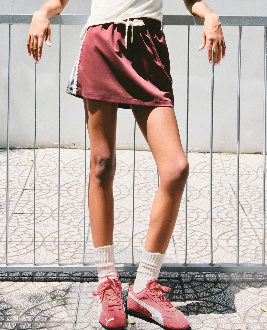 DEZUS - Chân váy chữ A mini phối dây rút viền sọc Gadila