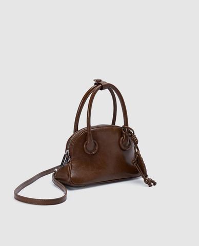  URBAN REVIVO - Túi xách nữ hình thang phối charm 