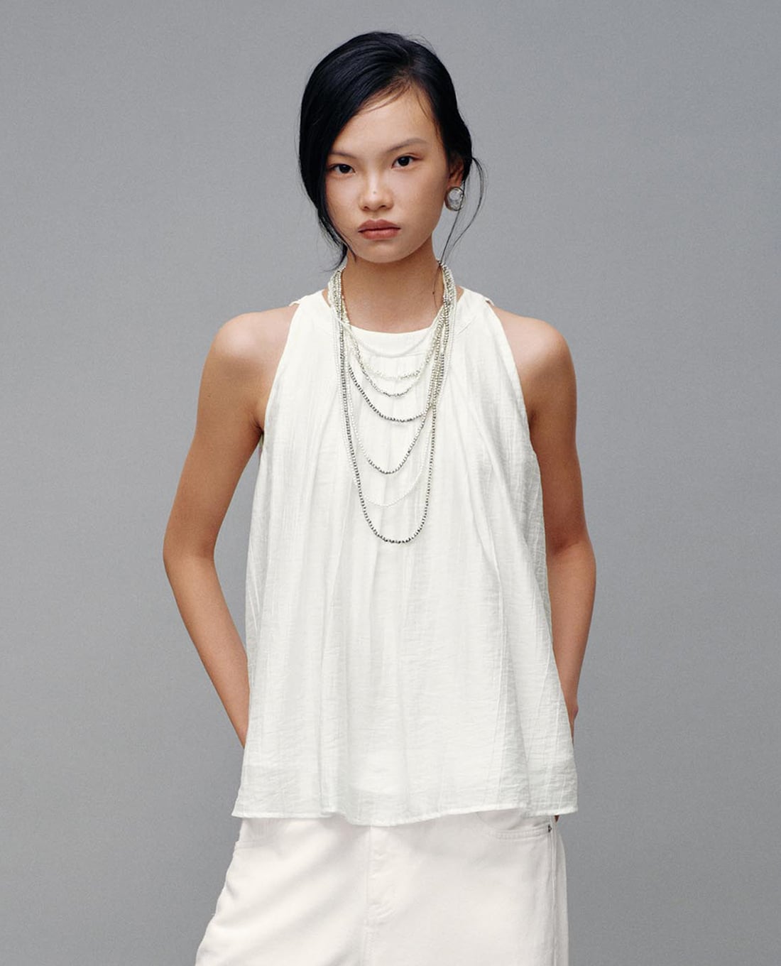 URBAN REVIVO - Áo sát nách nữ cổ tròn xếp li dáng xòe