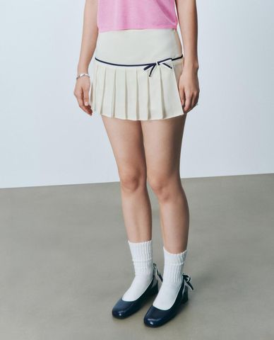  URBAN REVIVO - Chân váy xếp li mini phối viền 
