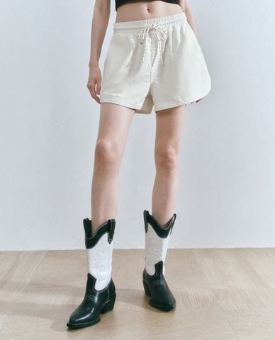  URBAN REVIVO - Quần short jeans nữ ống rộng phối dây rút 