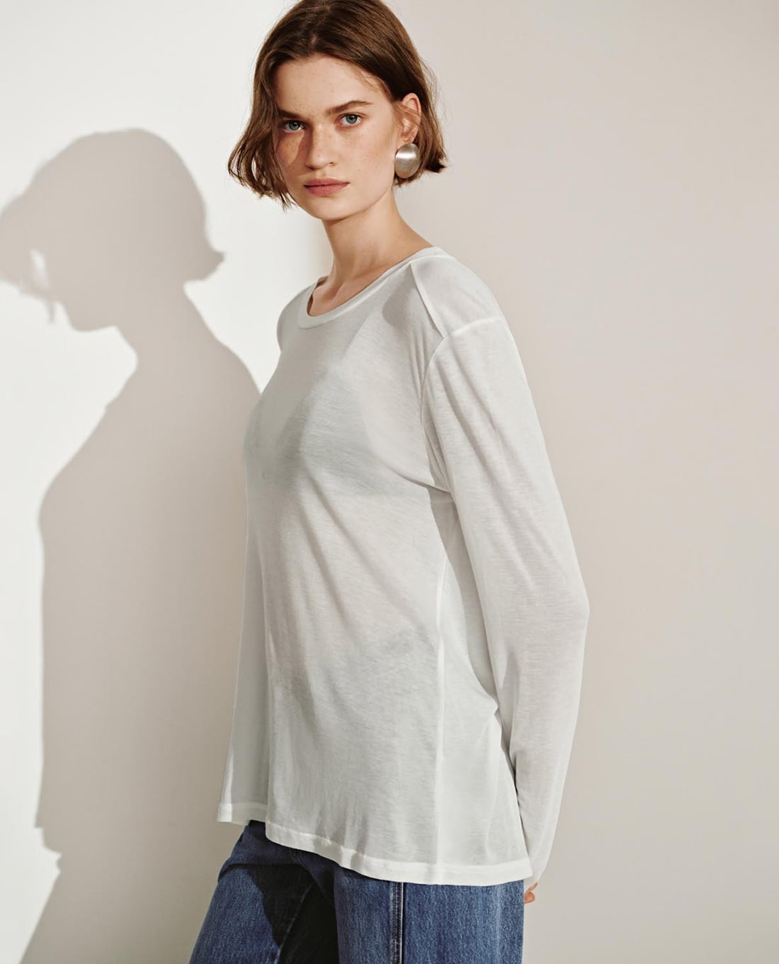 URBAN REVIVO - Áo dệt kim nữ cổ tròn tay dài phom suông