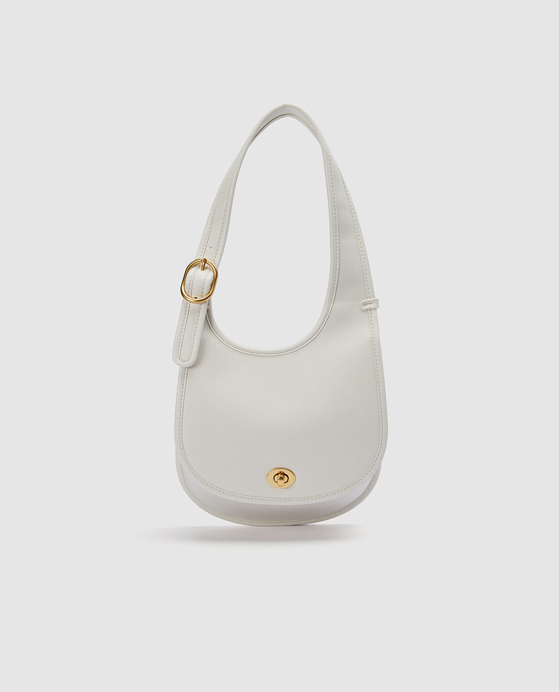 URBAN REVIVO - Túi đeo vai nữ phom bo tròn khoá xoay