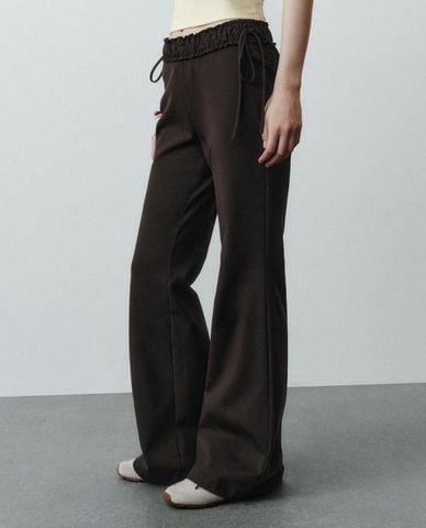  URBAN REVIVO - Quần nữ ống loe lưng thun phối nơ 