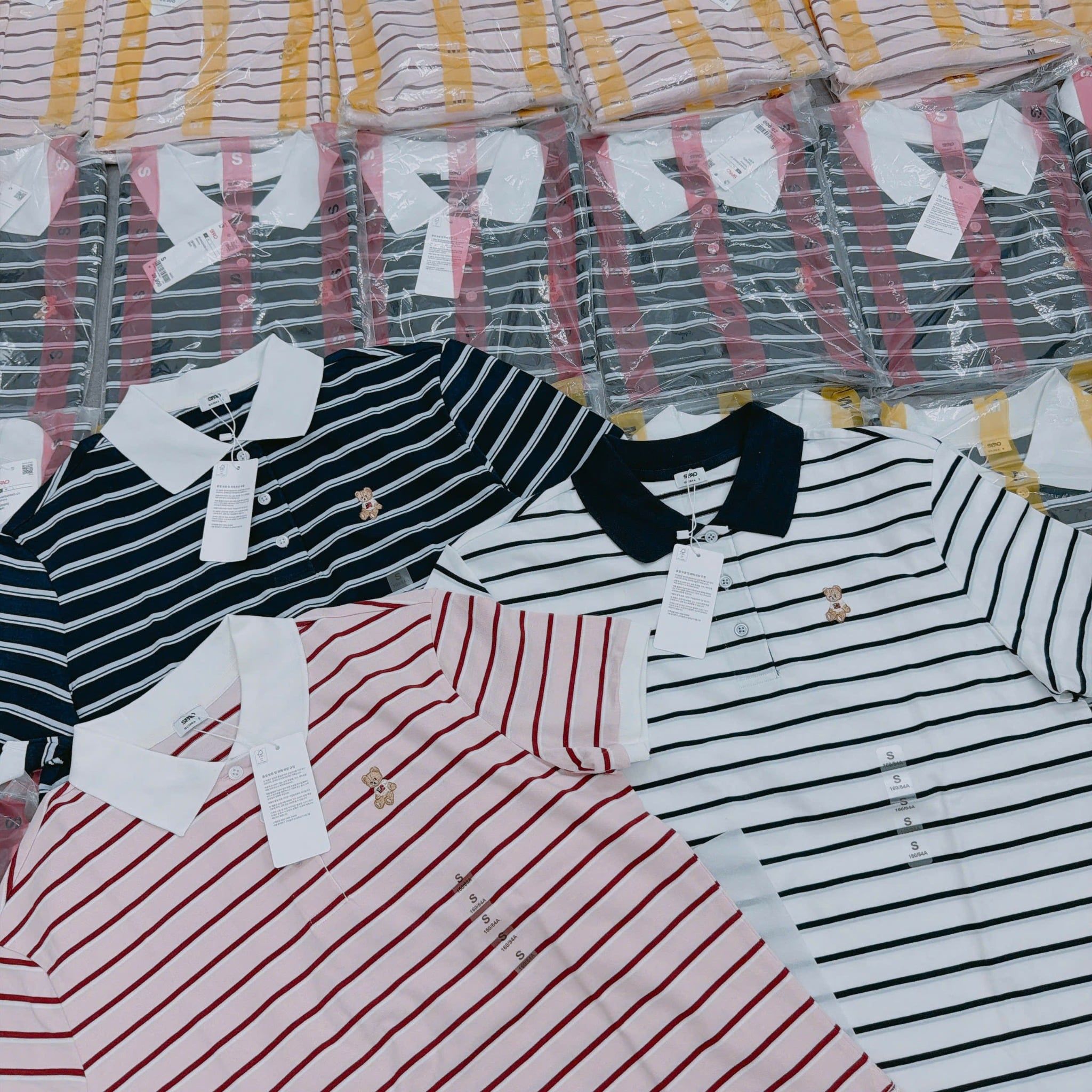  Áo Polo SPAO [Nữ] - Bear Sọc Ngang Trắng SS26 
