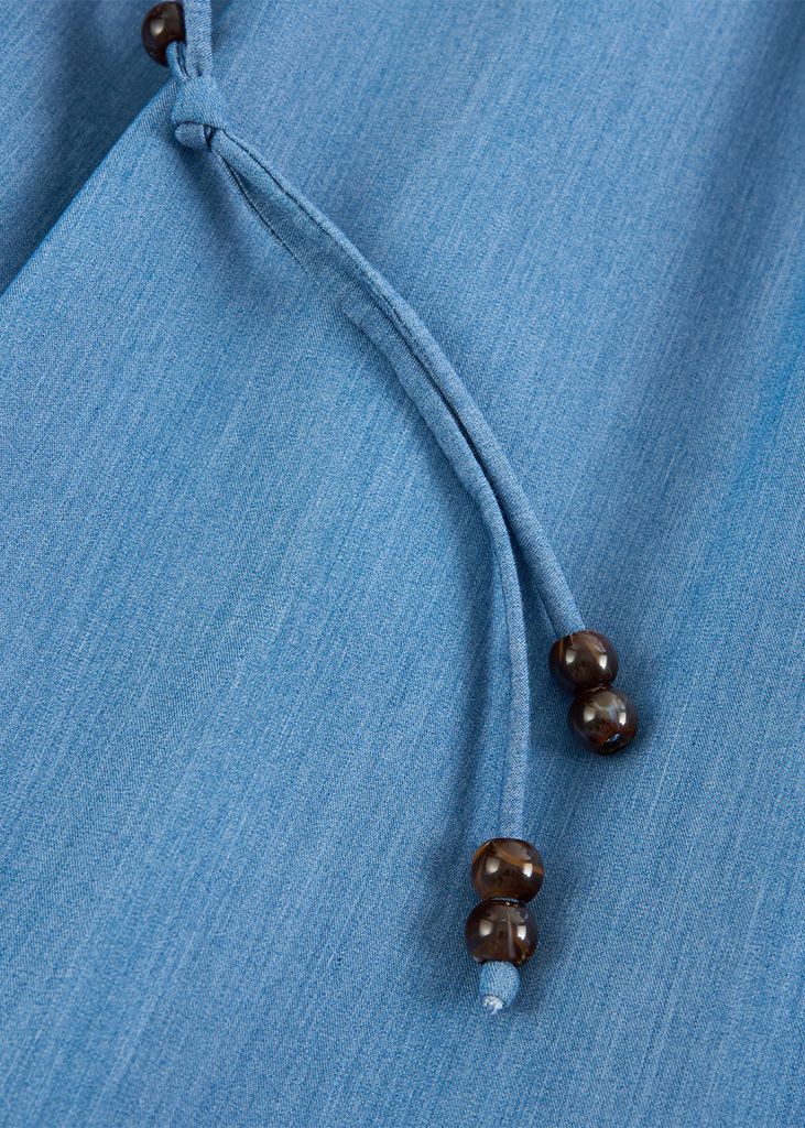 Đầm Jeans Nữ Sát Nách Dáng Xòe - Thiết Kế Váy Thắt Eo Gấu Bí