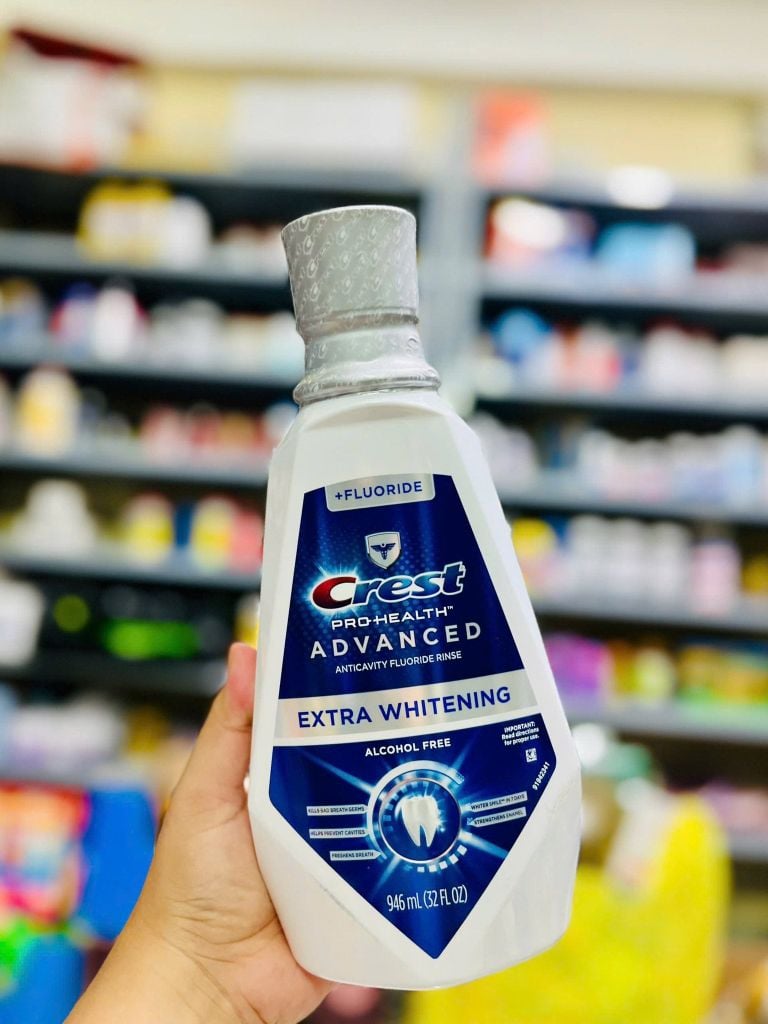Nước Súc Miệng Crest Advanced Extra Whitening - 946ML