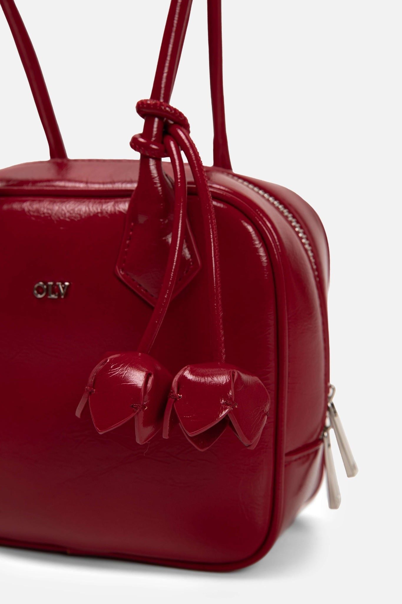 Túi xách da bóng dây hoa Glossy Leather Hand Bag