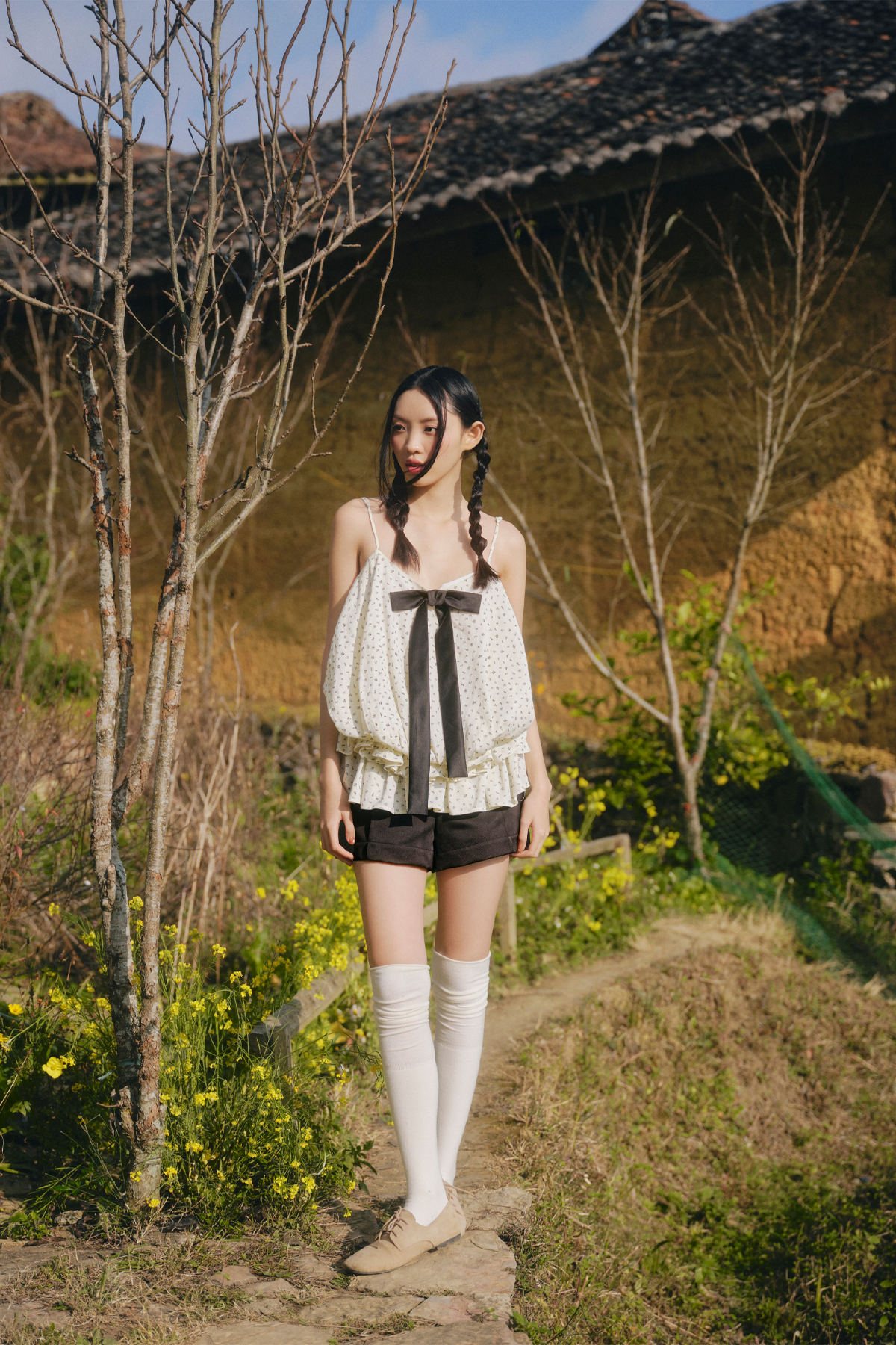 Áo 2 dây đính nơ Cream Dot Bow Ruffle Puff Cami Top