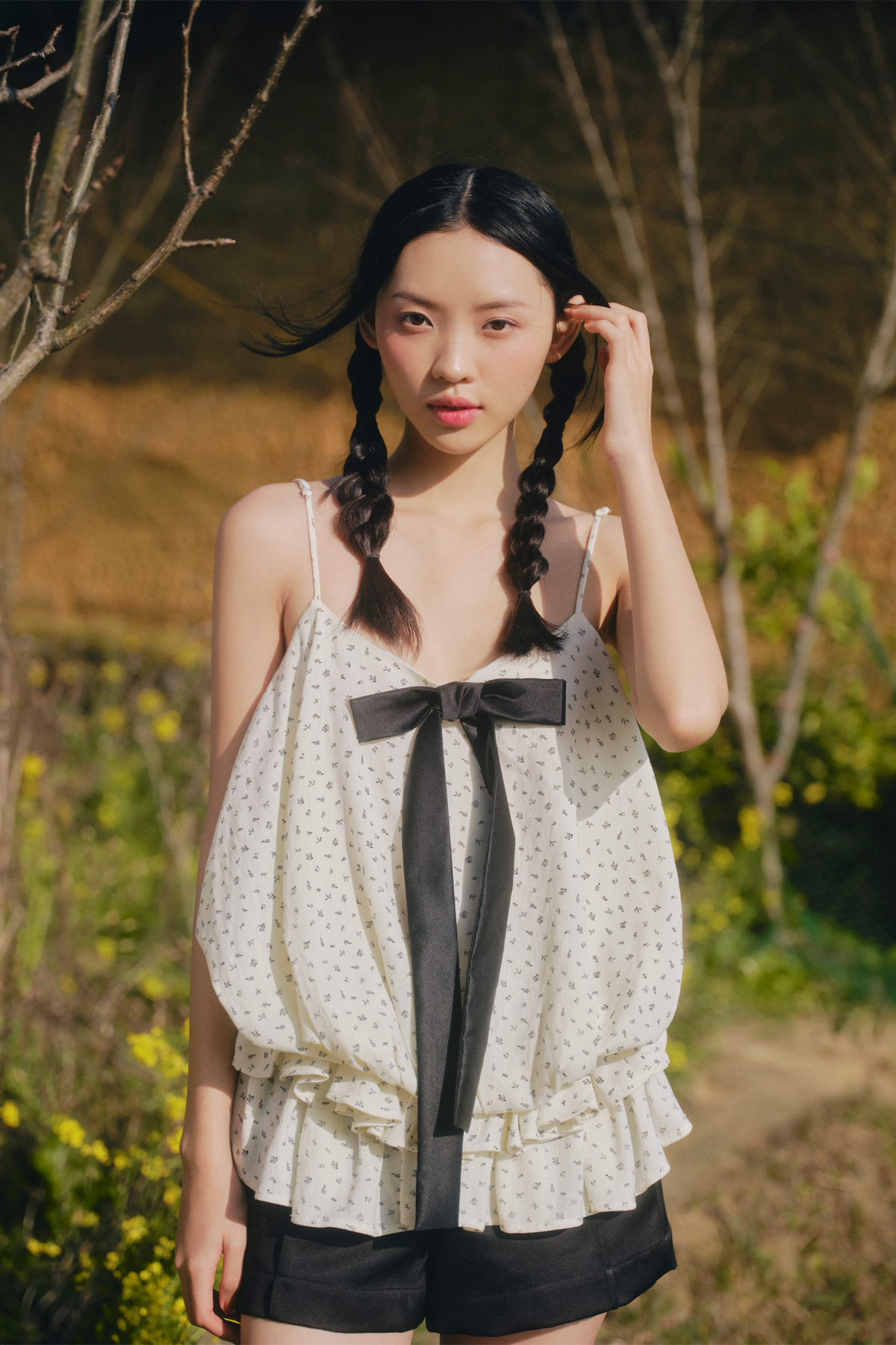 Áo 2 dây đính nơ Cream Dot Bow Ruffle Puff Cami Top