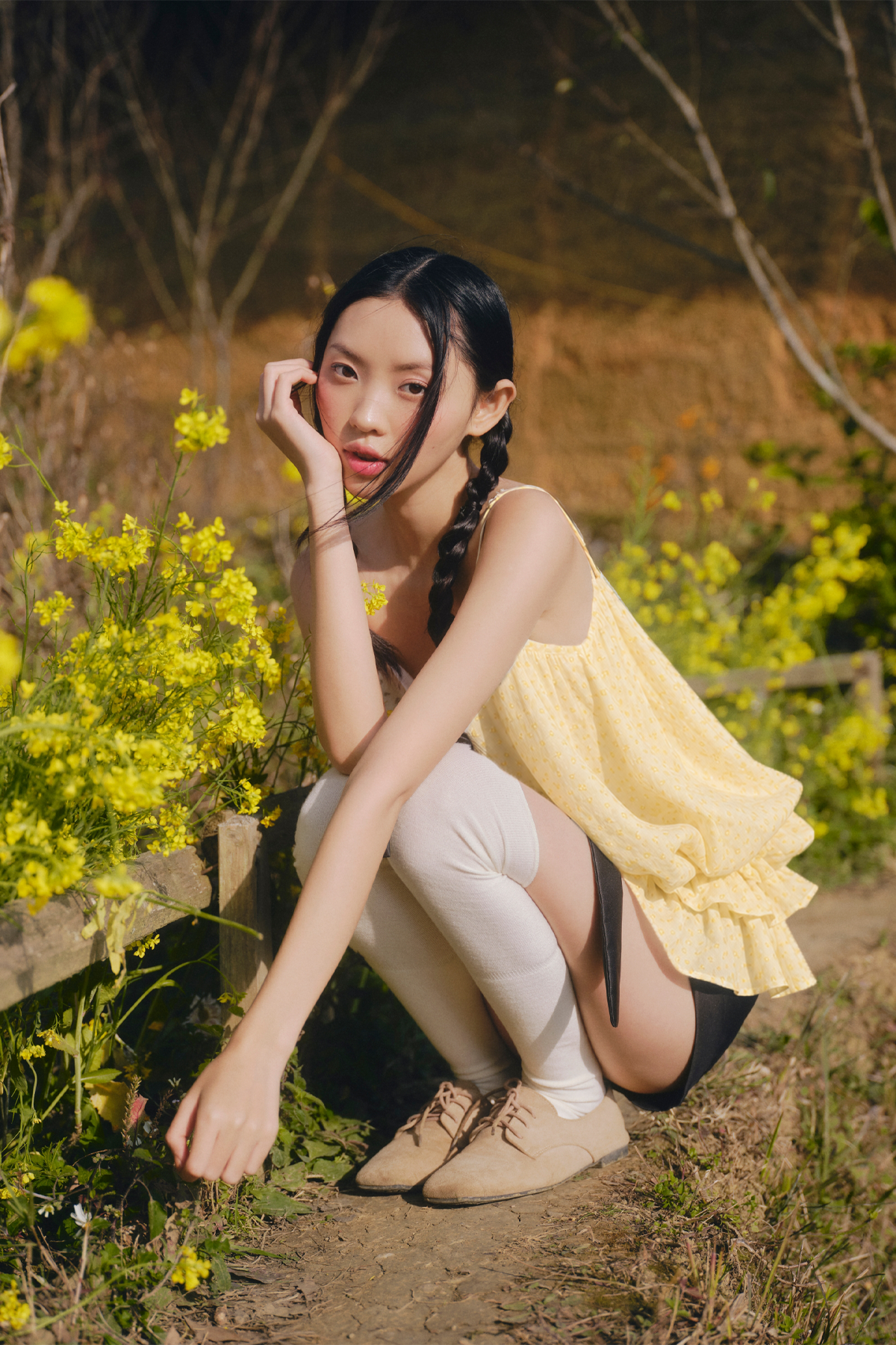 Áo 2 dây đính nơ Cream Dot Bow Ruffle Puff Cami Top