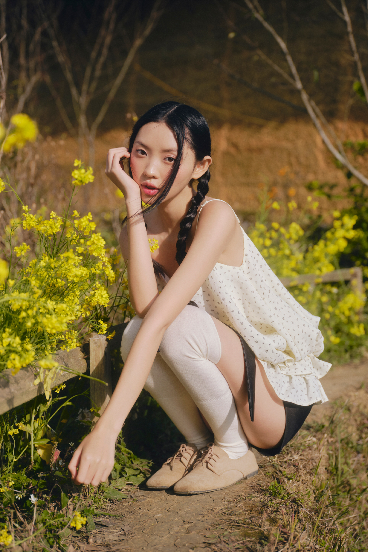 Áo 2 dây đính nơ Cream Dot Bow Ruffle Puff Cami Top