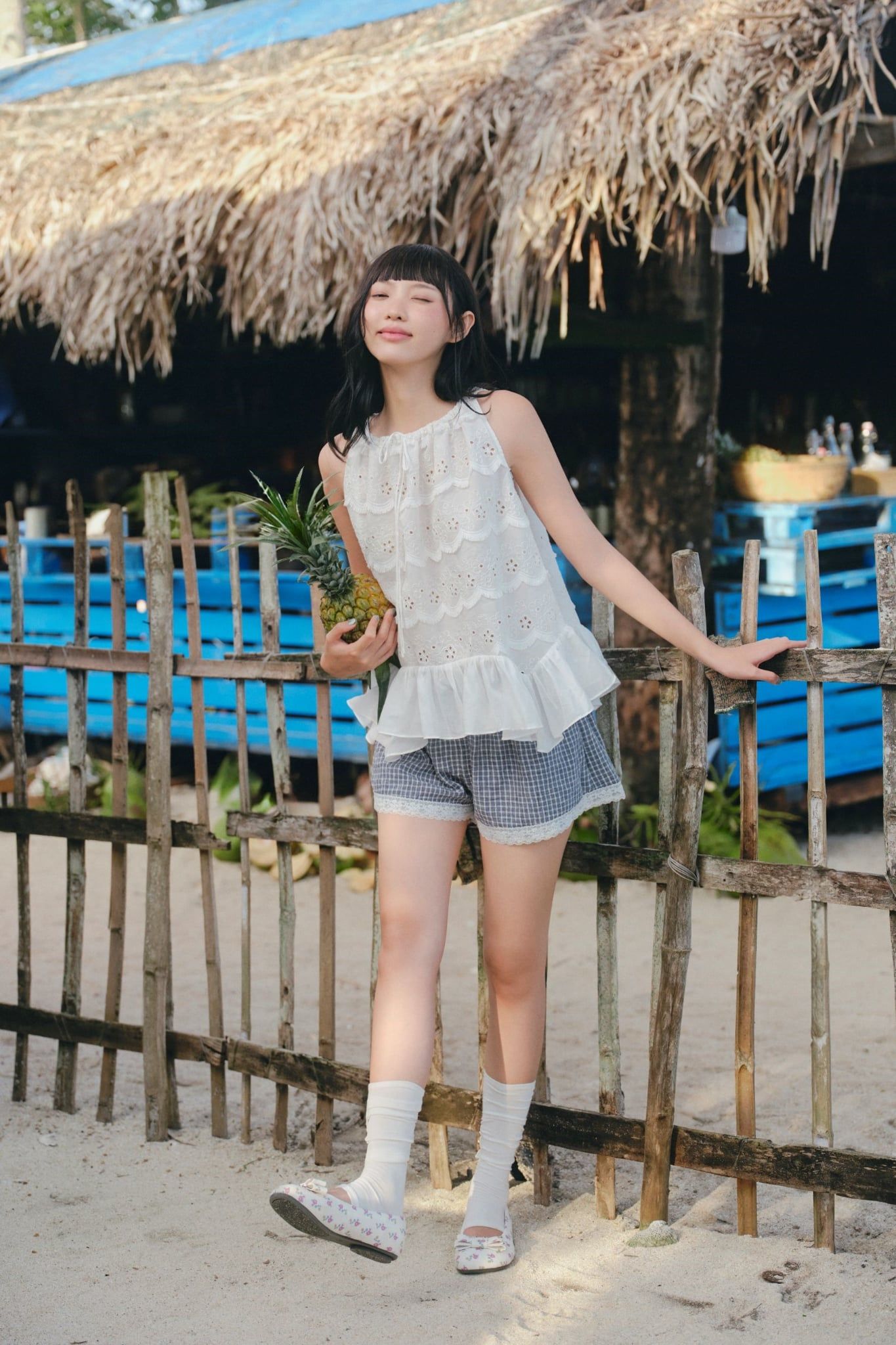Áo kiểu babydoll White Sleeveless Ruffled Top
