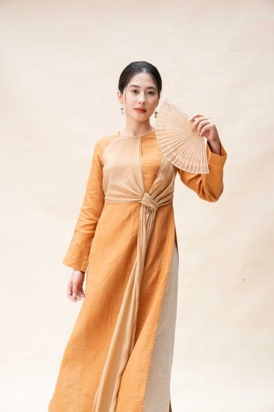 Áo dài đan vạt - Vàng bò
