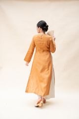 Áo dài đan vạt - Vàng bò