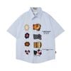 WES®️| ÁO SƠ MI NGẮN TAY THÊU HỌA TIẾT HOẠT HÌNH UNISEX 5253