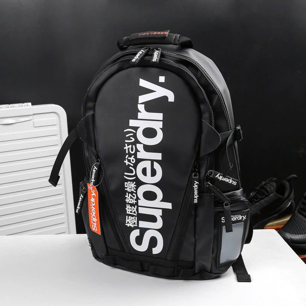  Balo Superdry Urban Logo Nhật Bản – Chống Nước, Phong Cách Unisex, Nhiều Ngăn, Cá Tính, Đi Học – Du Lịch 