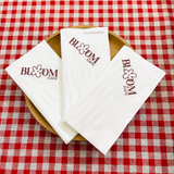 


																	 Khăn giấy ăn in logo BLOOM KAFE 