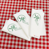 


																	 Khăn giấy ăn in logo Hoàng Lâm 