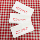 


																	 Khăn giấy ăn in logo RED APRON 