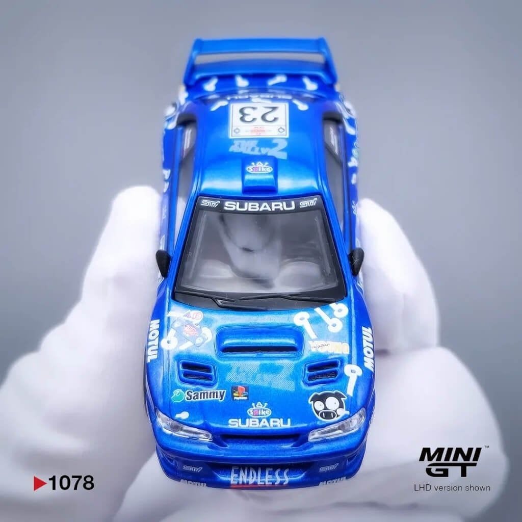 Mô hình xe Subaru Impreza WRC99 #23 2000 1:64 MiniGT